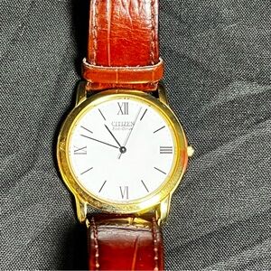 Citizen Eco-Drive Gold Watch with Brown Strap no batteries needed powered by sun